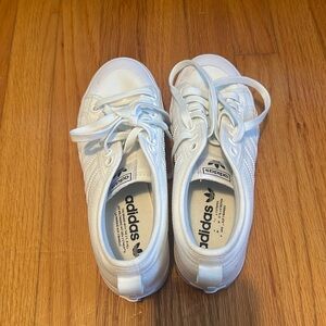 Adidas white sneakers women’s 8.5. Gently used. Some staining